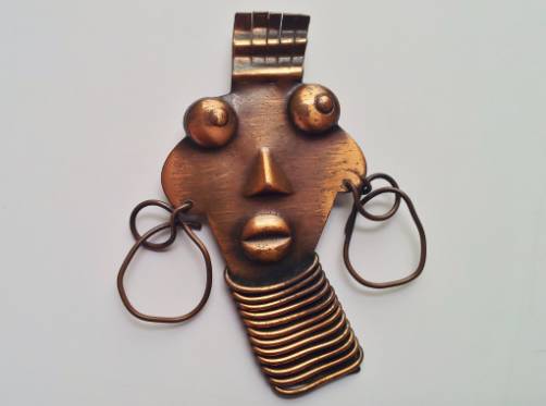 Rebajes vintage copper Ubangi pin, 1940`s American